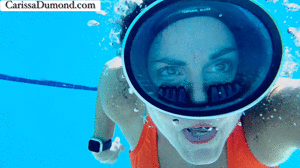 carissadumond.com - Carissa in the pool at the resort; swimming and blowing bubbles thumbnail